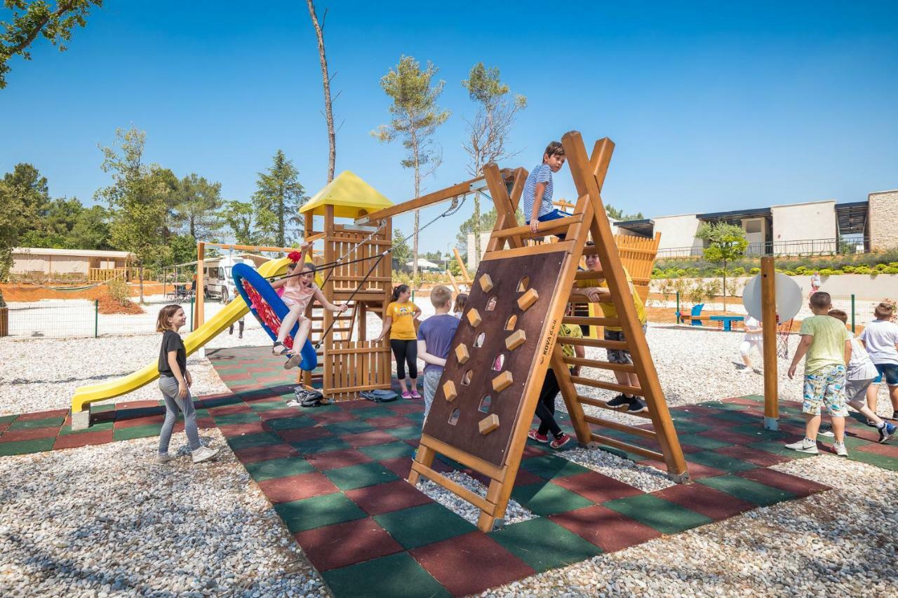 Mobile Homes Camping Santa Marina, Lanterna Tar-Vabriga Exterior photo Playground in the park